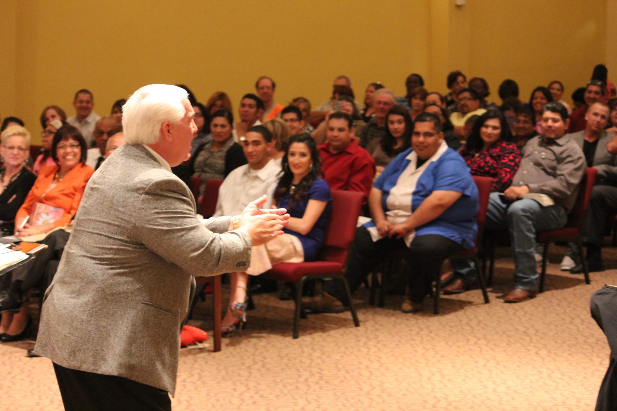 Dr. Buddy Bell teaching a seated audience at a Ministry of Helps workshop